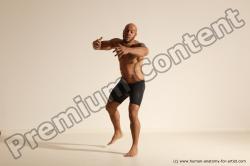 Underwear Gymnastic poses Man Black Muscular Bald Dancing Dynamic poses Academic